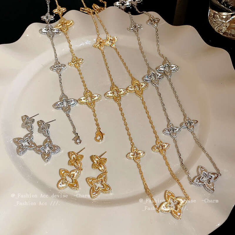 25 Luxury jewelry designer bracelet for Women Drawing process hollowed out lucky clover necklace high-end bracelet earrings sweater chain 4/ Leaf flow