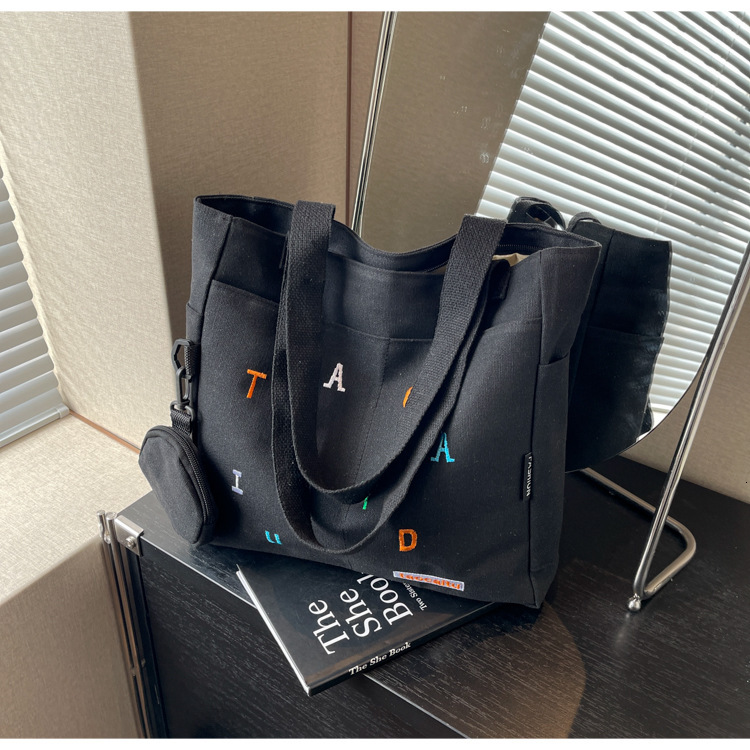 New Canvas Casual Artistic Printed Letter Personalized Large Capacity Single Shoulder Handheld Underarm Tote Bag for Women ddmymarket