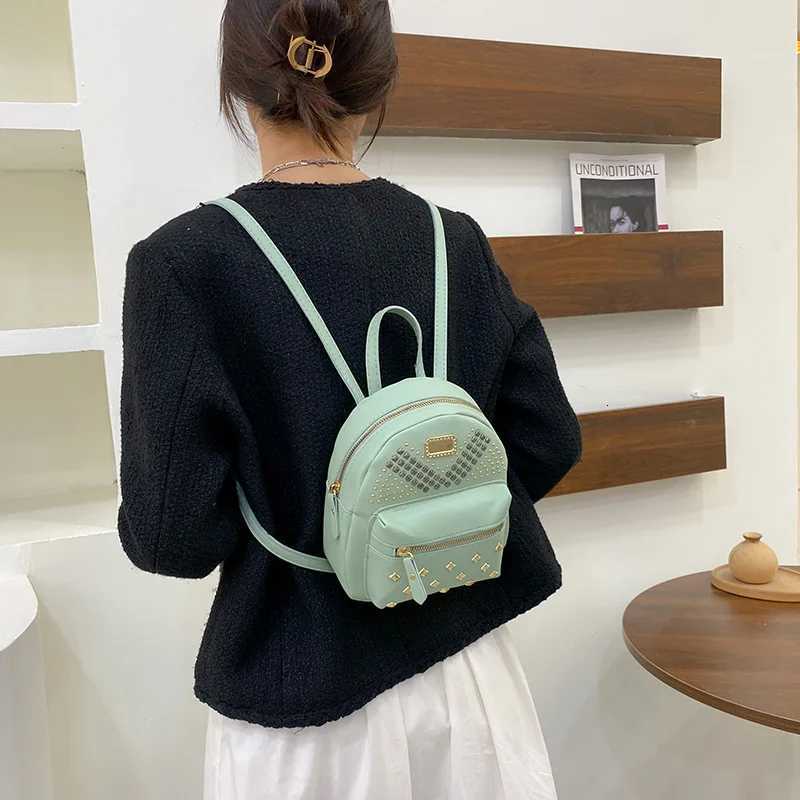 Riveted small schoolbag new womens school bag leisure backpack Y250811