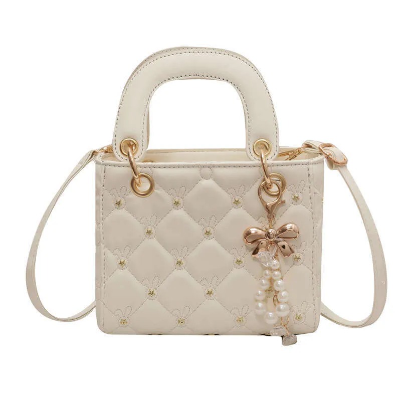 Chic Petite Squared Ladies' Travel Companion Elegant Handbag Ideal For Everyday Carry