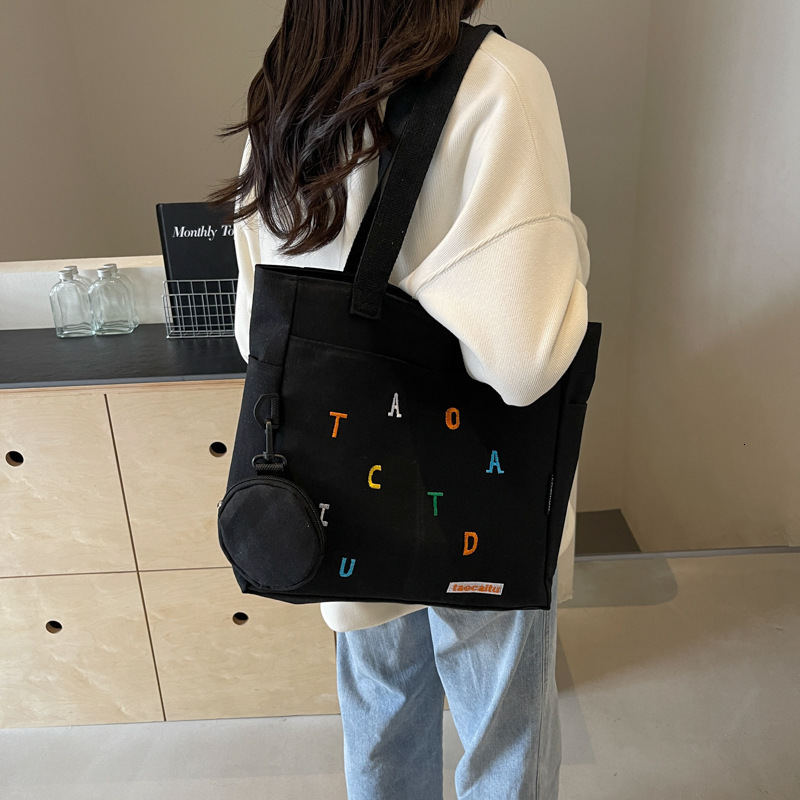 New Canvas Casual Artistic Printed Letter Personalized Large Capacity Single Shoulder Handheld Underarm Tote Bag for Women ddmymarket