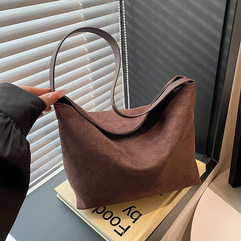 Casual Style Large Capacity Commuter Luxury Korean Niche Suede Matte Bucket Designer Shoulder Crossbody Bag for Women