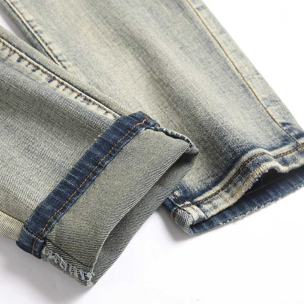 Mens Snake Embroidery Stretch Denim Jeans Streetwear Red Leather Patch Slim Tapered Pants with Holes And Rips Trousers X250812