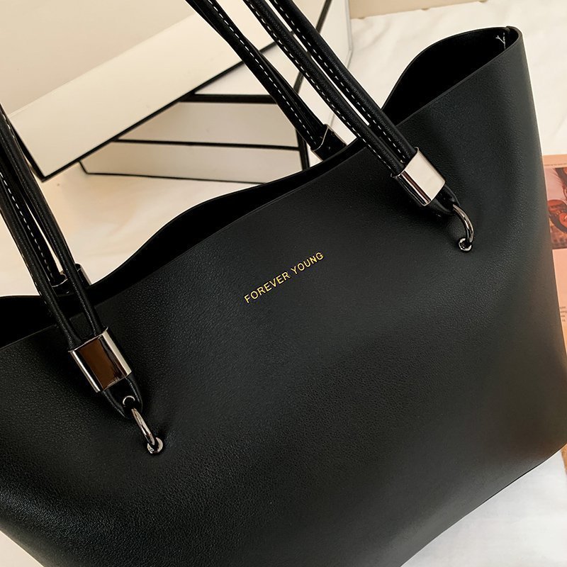 Elegant Womans Casual Shoulder Backpack with Roomy Compartment & Trendy Design