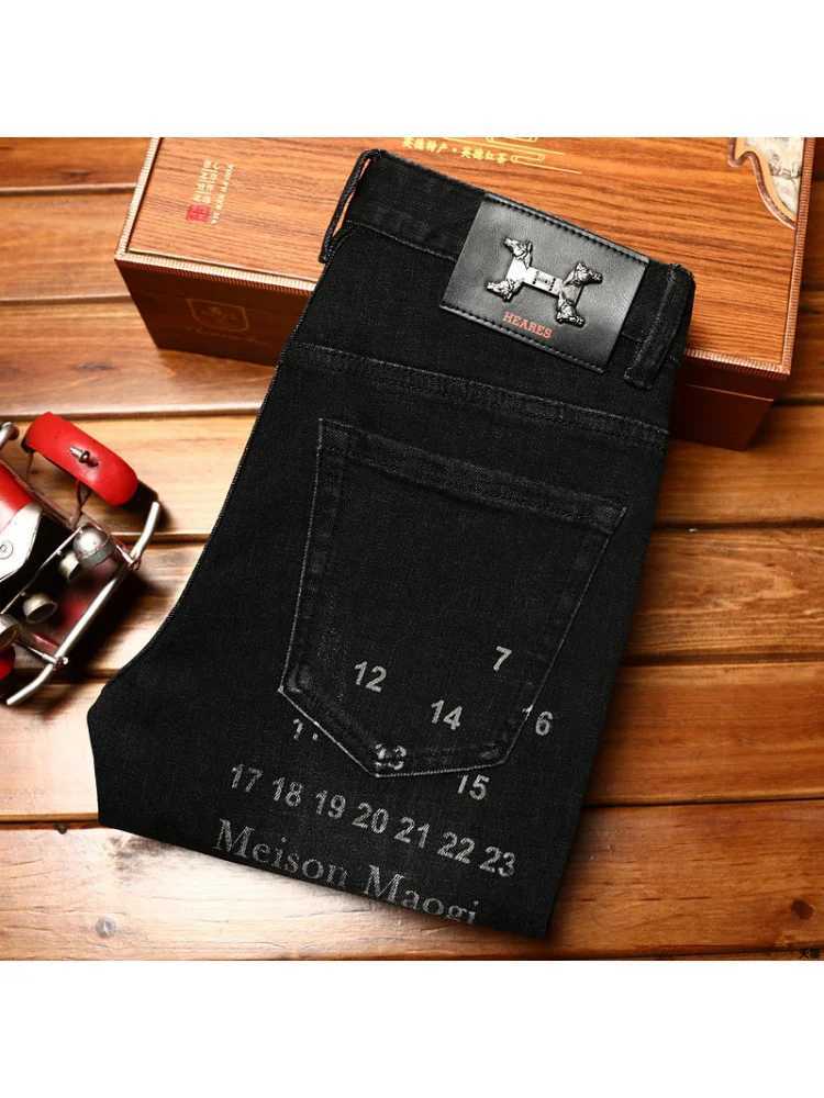High-end trendy printed jeans for men with elastic slim fit and small feet personalized Korean version of youth casual denim. X250812