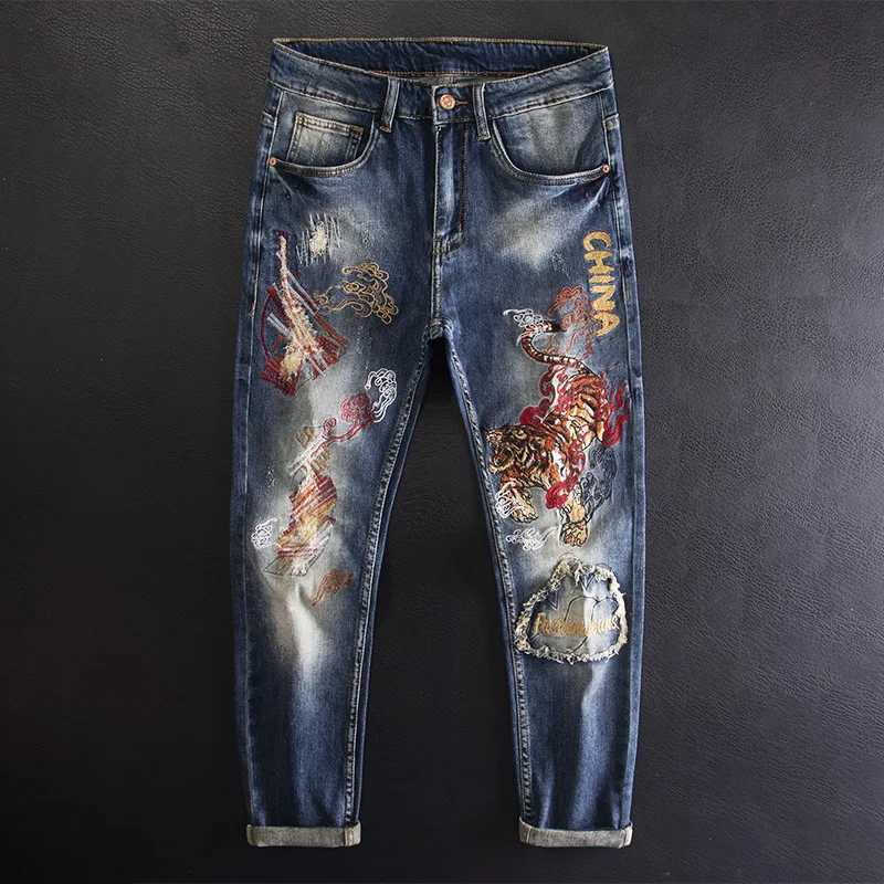 Tiger embroidery printed jeans for men fashionable high-end trendy personalized slim fit elastic denim pants X250812
