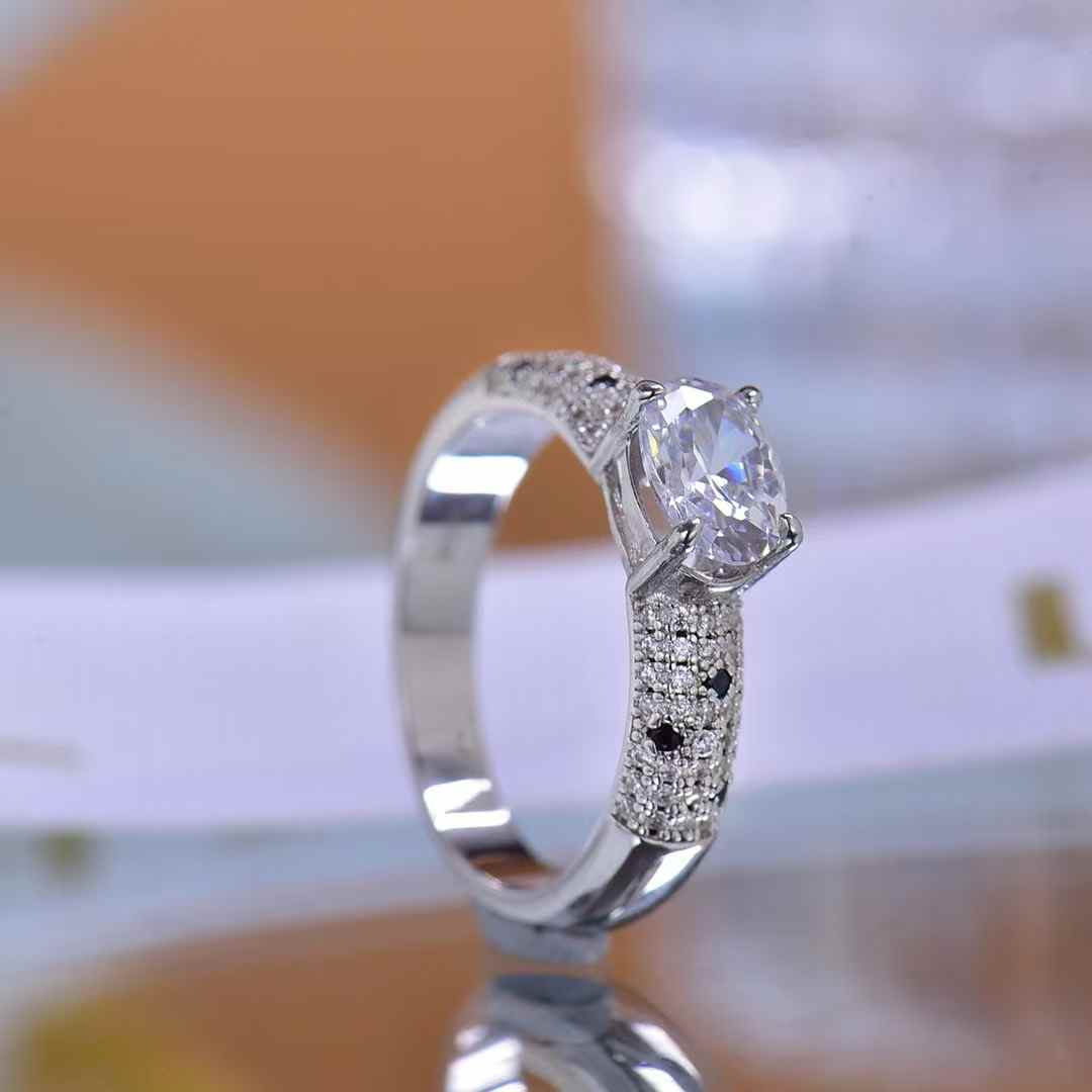 Sparkling Oval Moissanite Ring with Snake Textured Band Ideal for Engagement Statement Style Eye Catching Outfits