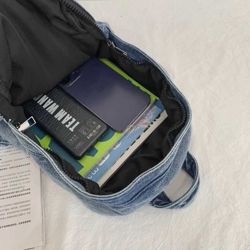 A classic popular solid color denim backpack comfortable fabric large capacity suitable for business travel commuting shoppin Y250811