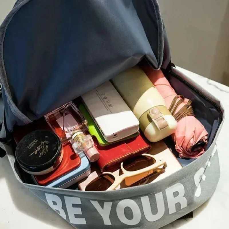 Fashion trend backpack for men and women high school student bag large capacity Korean version of the. W250812