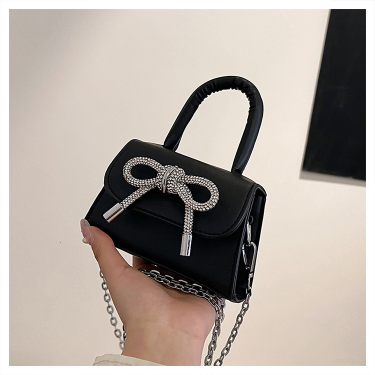 Small niche design bag for women 2025 new designer handbag versatile chain crossbody bag mouth red envelope