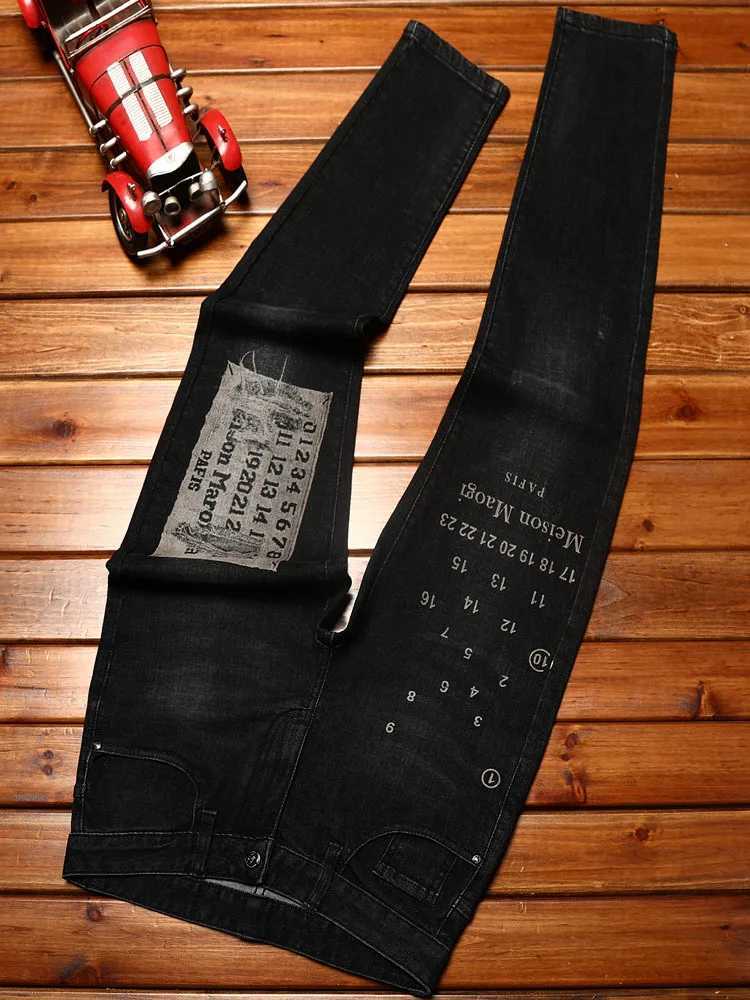 High-end trendy printed jeans for men with elastic slim fit and small feet personalized Korean version of youth casual denim. X250812