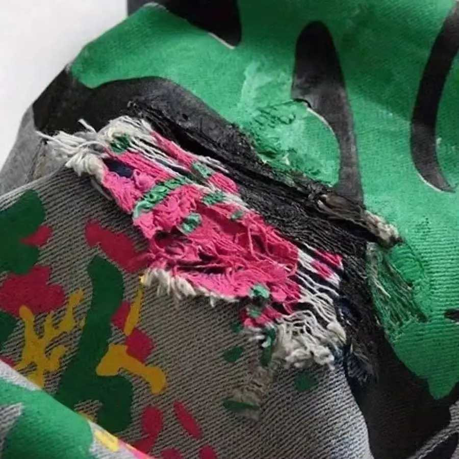 European and American new fashion trend old washed hole printed jeans X250812