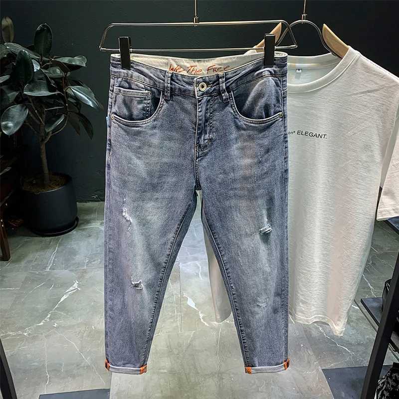 2021 Mens Trendy Brand Loose Summer Thin Elastic Feet Pants Ripped Denim Jeans Mens Korean Harem Teenagers Cropped Pants X250812