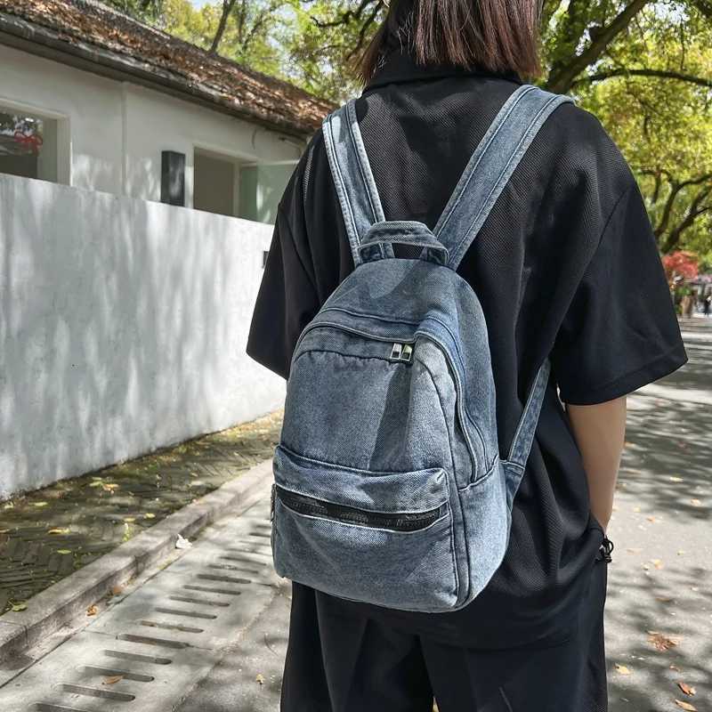 A classic popular solid color denim backpack comfortable fabric large capacity suitable for business travel commuting shoppin Y250811