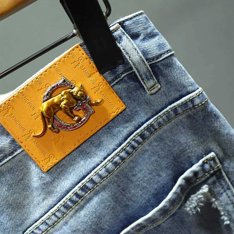 Spring New Blue Ripped Hole Jeans Mens Elastic Slim Stitching Patch Korean Fashion Mens Clothing Denim Trousers Streetwear X250812