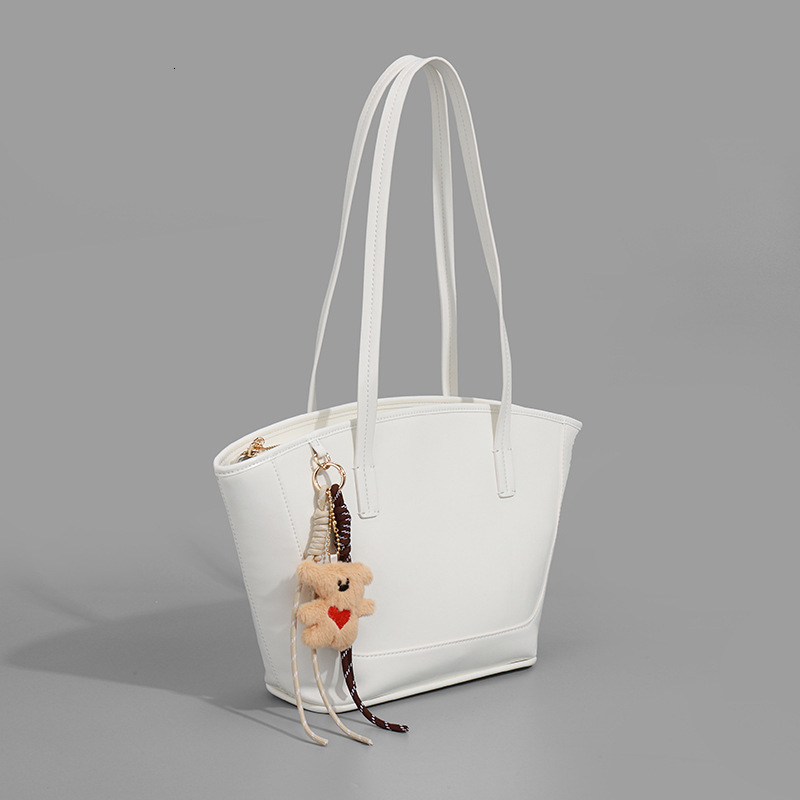 2025 Autumn New Women s Shoulder Bag Large Capacity Cute Pendant Women s Handbag Autumn New Commuter Bag Autumn New bag women s Simple Style Solid Col