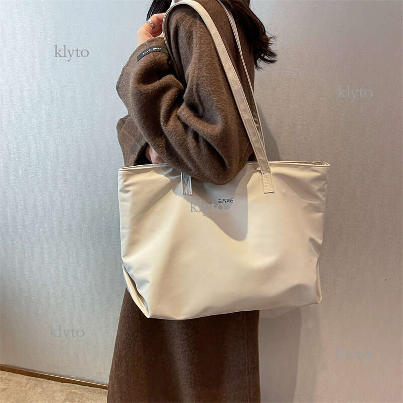 Designer Nylon tote bag Waterproof Single Shoulder Canvas Commuter for Women Capacity Summer Work Tote Handheld Large Bags