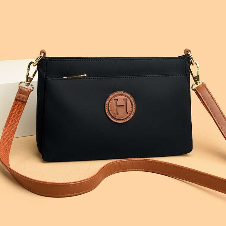 Commuting Women Zipper Shoulder Crossbody 2025 New Niche Design Artistic Canvas Stitched Postman Bag