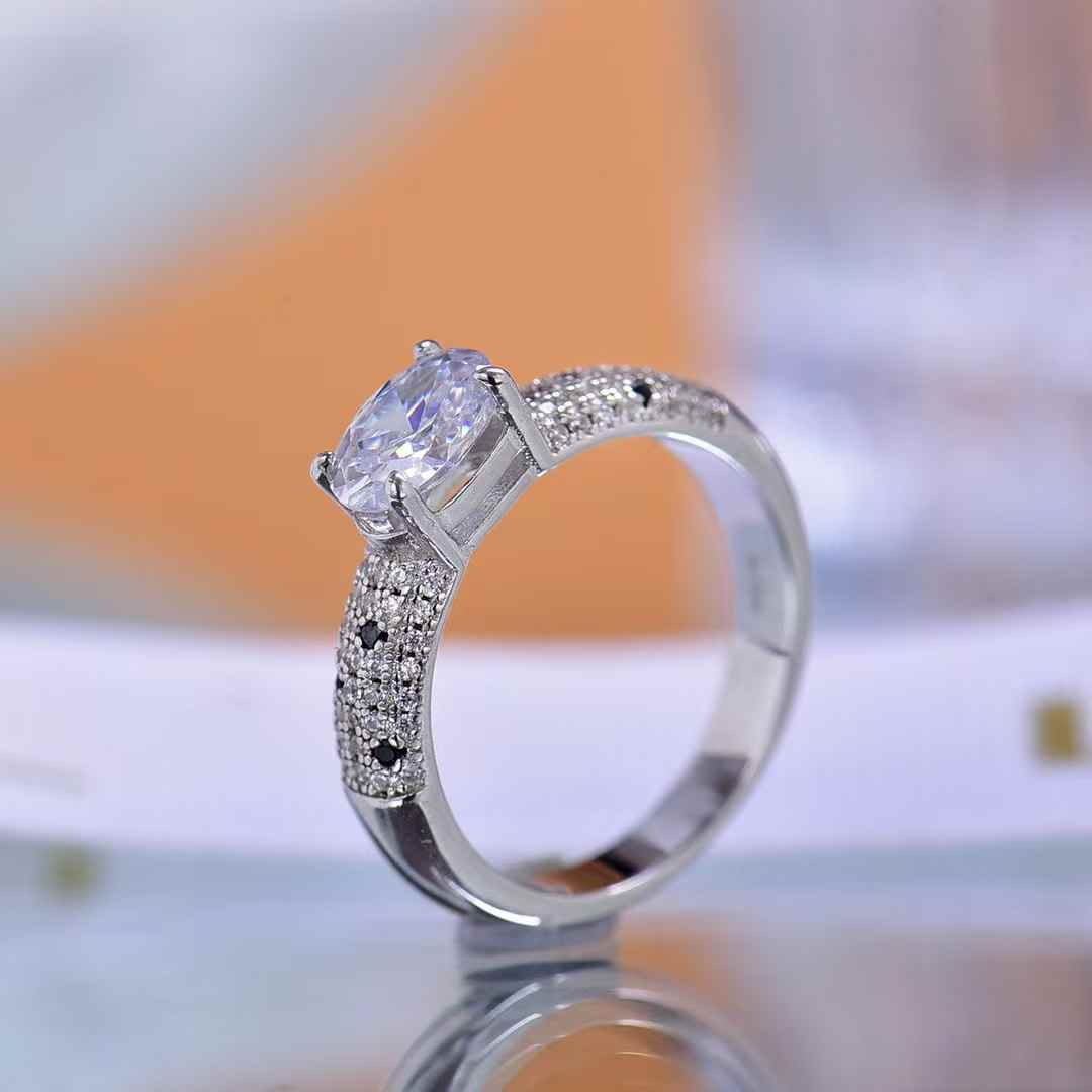 Sparkling Oval Moissanite Ring with Snake Textured Band Ideal for Engagement Statement Style Eye Catching Outfits