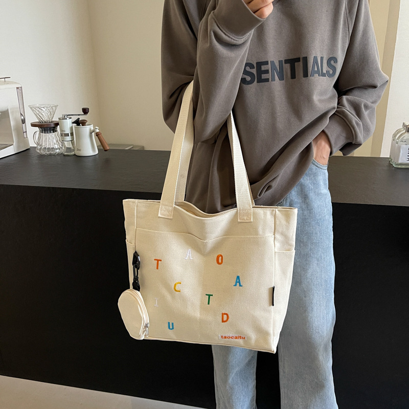 New Canvas Casual Artistic Printed Letter Personalized Large Capacity Single Shoulder Handheld Underarm Tote Bag for Women ddmymarket
