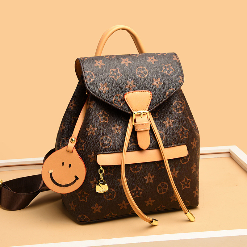 Designer's new women's printed backpack casual and trendy travel backpack large capacity yellow brown free shipping