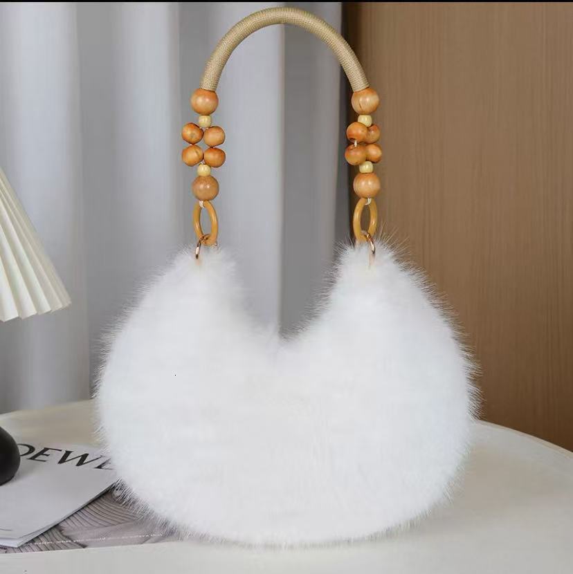 2025 Autumn New Women's Shoulder Bag Autumn Fur Handbag Sexualized Creative Handbag Women's Crossbody Bag Designer Bag