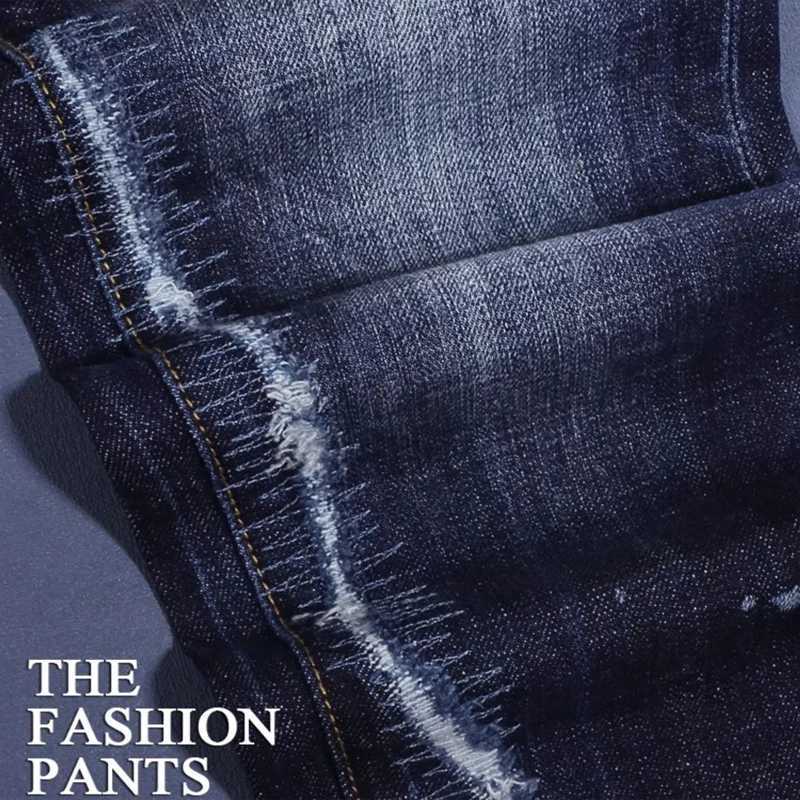 Fashionable mens deep blue jeans with scratches washed water nostalgic stretch slim fit painted jeans designer high street X250812