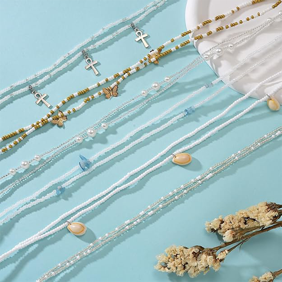 Tornito 8Pcs 31.5 Inches African Waist Bead Chain Elastic Belly Beads Butterfly Shell Layered Body Chain Golden White Tone Jewelry Accessories for Wom