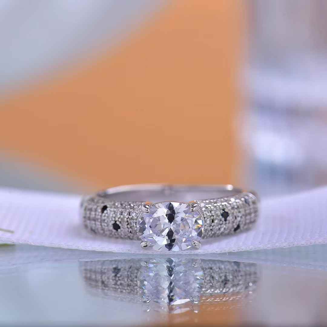 Sparkling Oval Moissanite Ring with Snake Textured Band Ideal for Engagement Statement Style Eye Catching Outfits