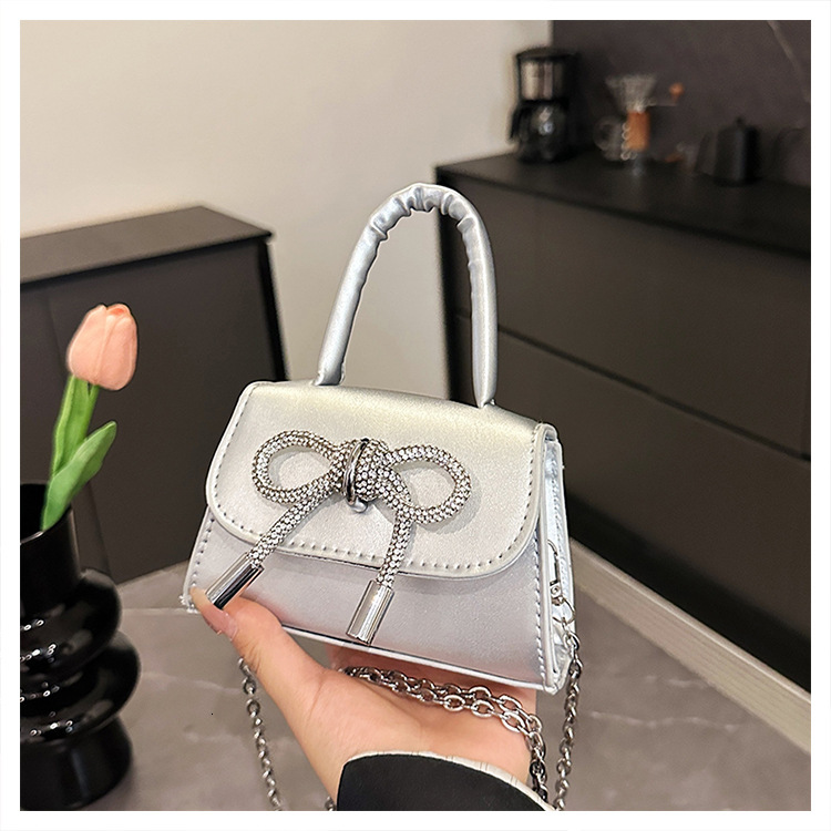 Small niche design bag for women 2025 new designer handbag versatile chain crossbody bag mouth red envelope