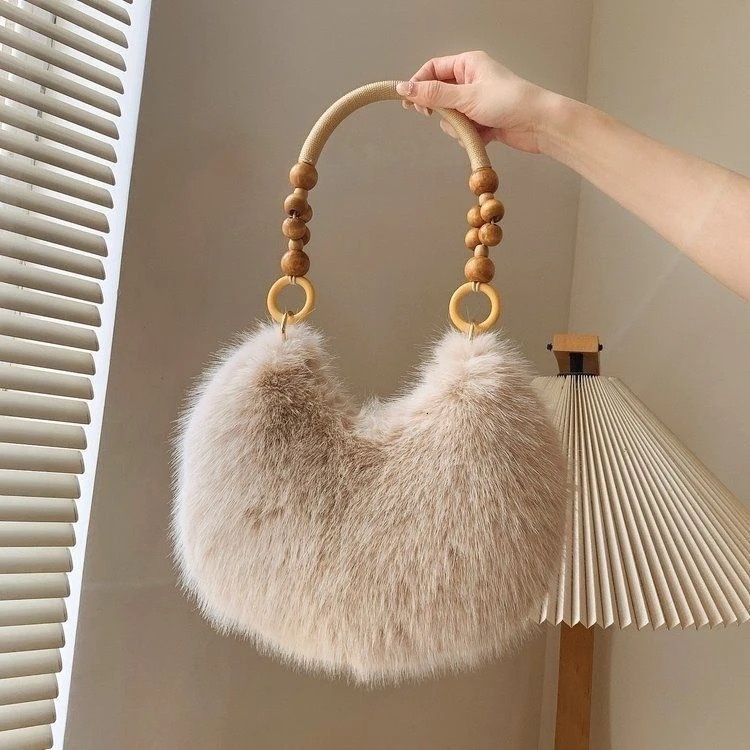 2025 Autumn New Women's Shoulder Bag Autumn Fur Handbag Sexualized Creative Handbag Women's Crossbody Bag Designer Bag