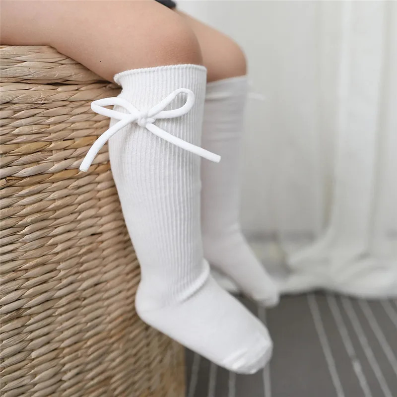 Autumn Kids Knee High Socks Baby Girls Boys Bowknot Flat Long Sock Soft Cotton Solid Children Princess Socken For 07 Years 250812