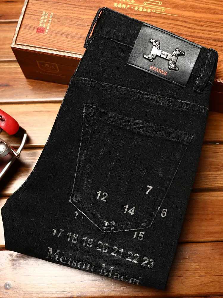 High-end trendy printed jeans for men with elastic slim fit and small feet personalized Korean version of youth casual denim. X250812