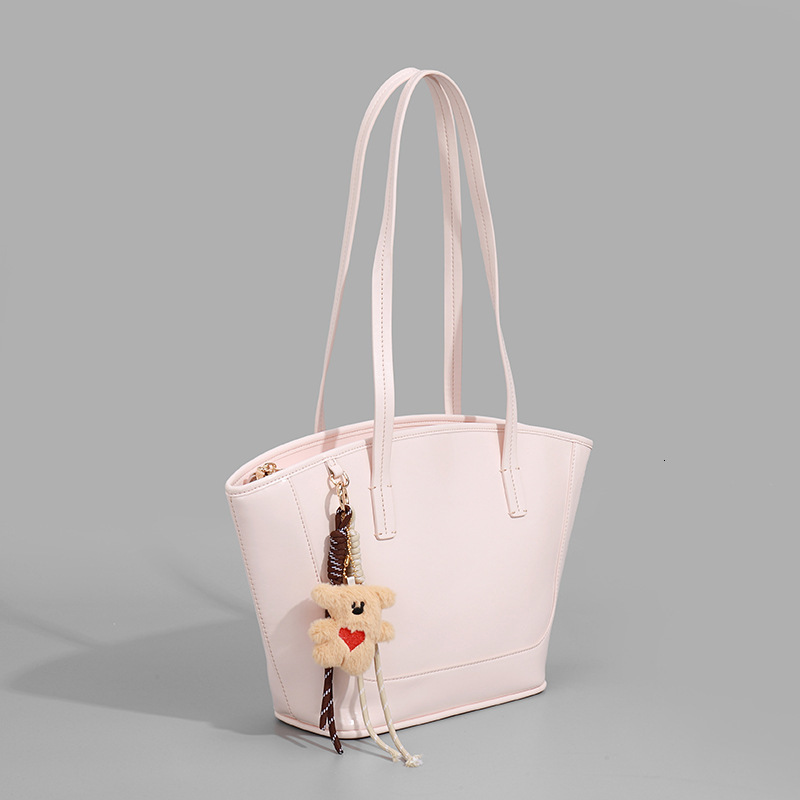 2025 Autumn New Women s Shoulder Bag Large Capacity Cute Pendant Women s Handbag Autumn New Commuter Bag Autumn New bag women s Simple Style Solid Col