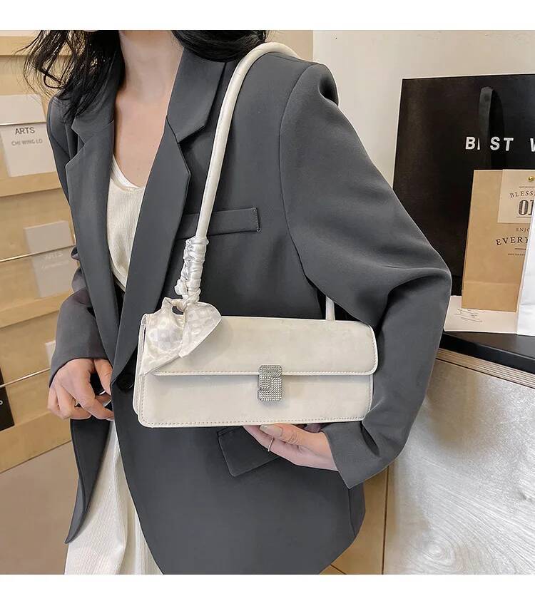 New French Niche Women's Sier Shoulder Pop Texture Underarm Baguette Bags Designer Handbag Women Bag high-quality