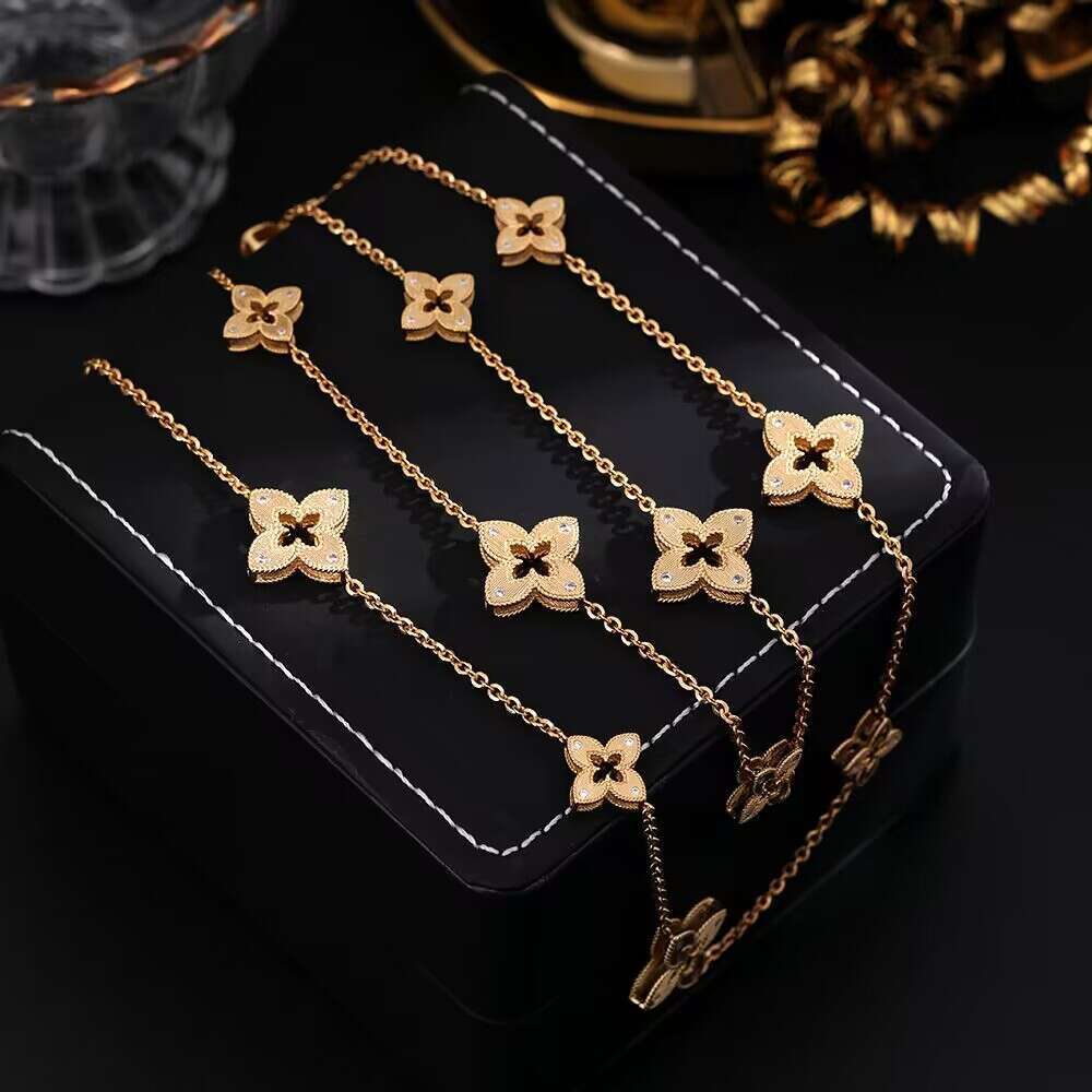 INS Luxury jewelry designer bracelet for Women Drawing process hollowed out lucky clover necklace high-end bracelet earrings sweater chain 4/ Leaf flower necklace