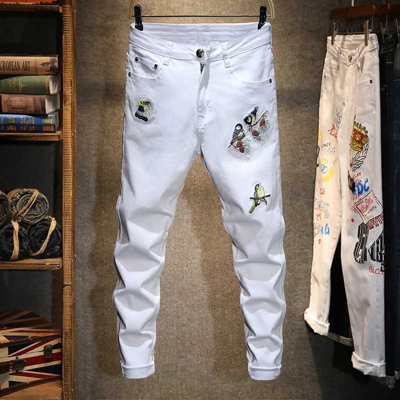 Personality fashion White jeans mens fashion hot stamping flower embroidery street handsome slim fit skinny stretch trousers X250812