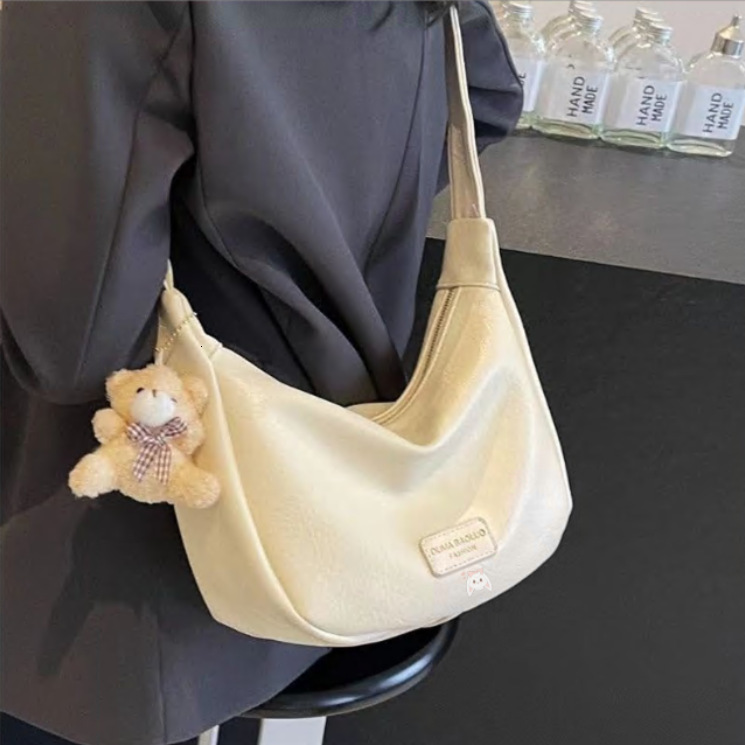 designer bag Casual Versatile Dumpling Bag Fashion Handheld Pattern Small Bag for Women 2024 New Spring Commuting Single Shoulder Luxury bag Crossbody