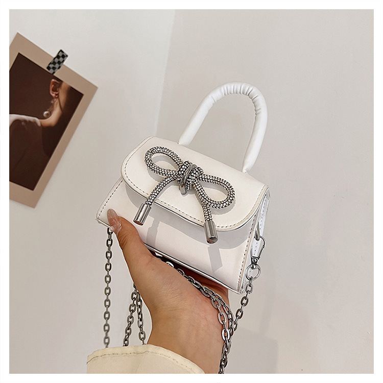 Small niche design bag for women 2025 new designer handbag versatile chain crossbody bag mouth red envelope