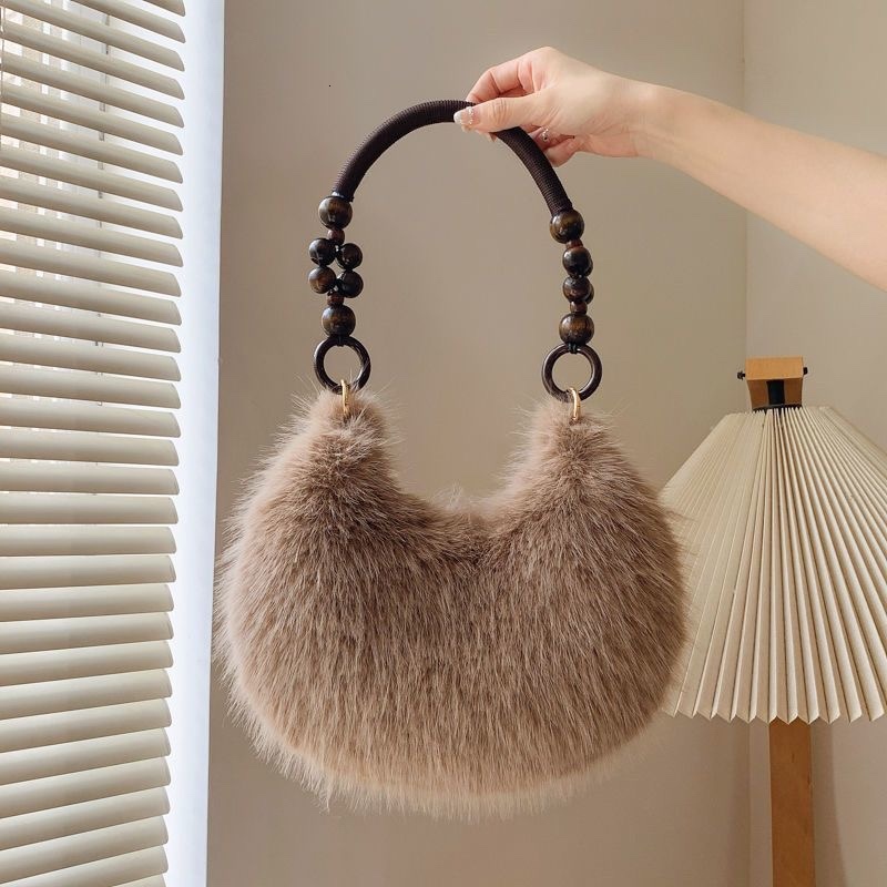 2025 Autumn New Women's Shoulder Bag Autumn Fur Handbag Sexualized Creative Handbag Women's Crossbody Bag Designer Bag