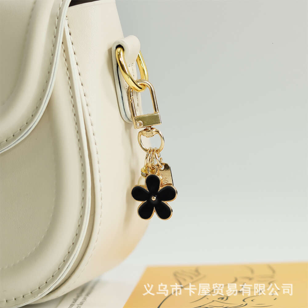 INS Metal Daisy Pearl Keychain Niche Flower Bluetooth Earphone Case Accessories