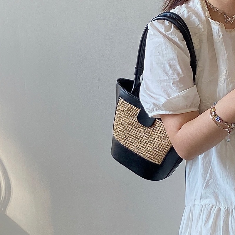 2025 New Shaped Straw Summer Beach Matching Patchwork Color Block Ins Simple Style Woven Women's Bag ddmymarket