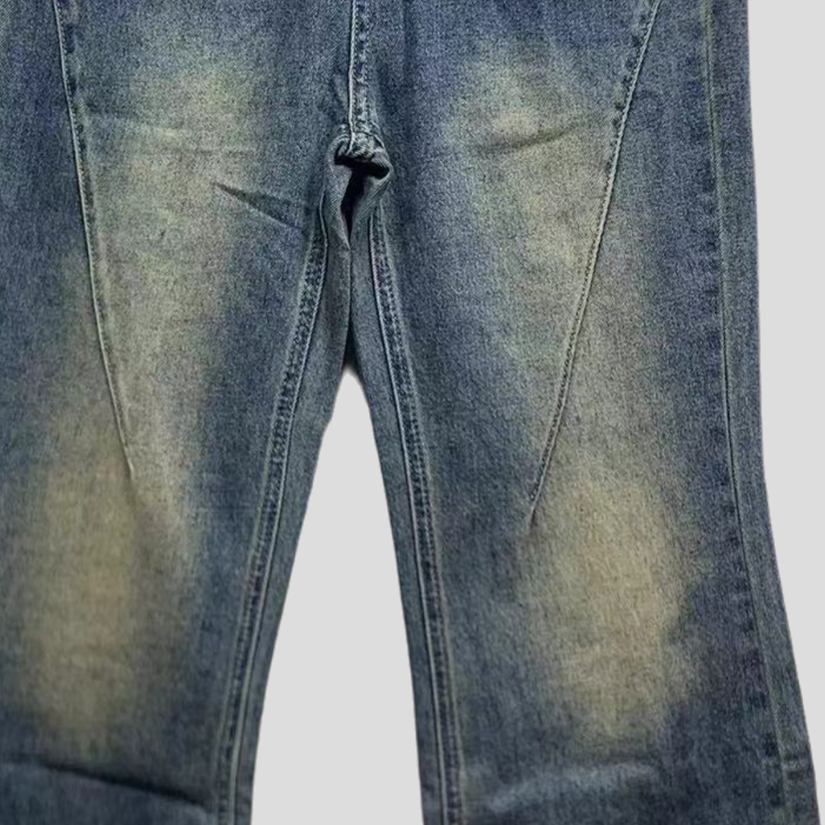 Retro distressed micro-flared jeans with a built-in fashion filter 24-0812