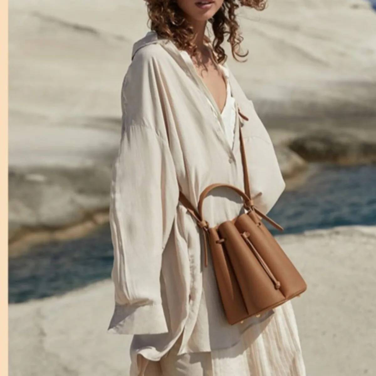 new drawstring fashion po niche design storage bag, stylish single shoulder crossbody handbag, petal versatile bag high-quality