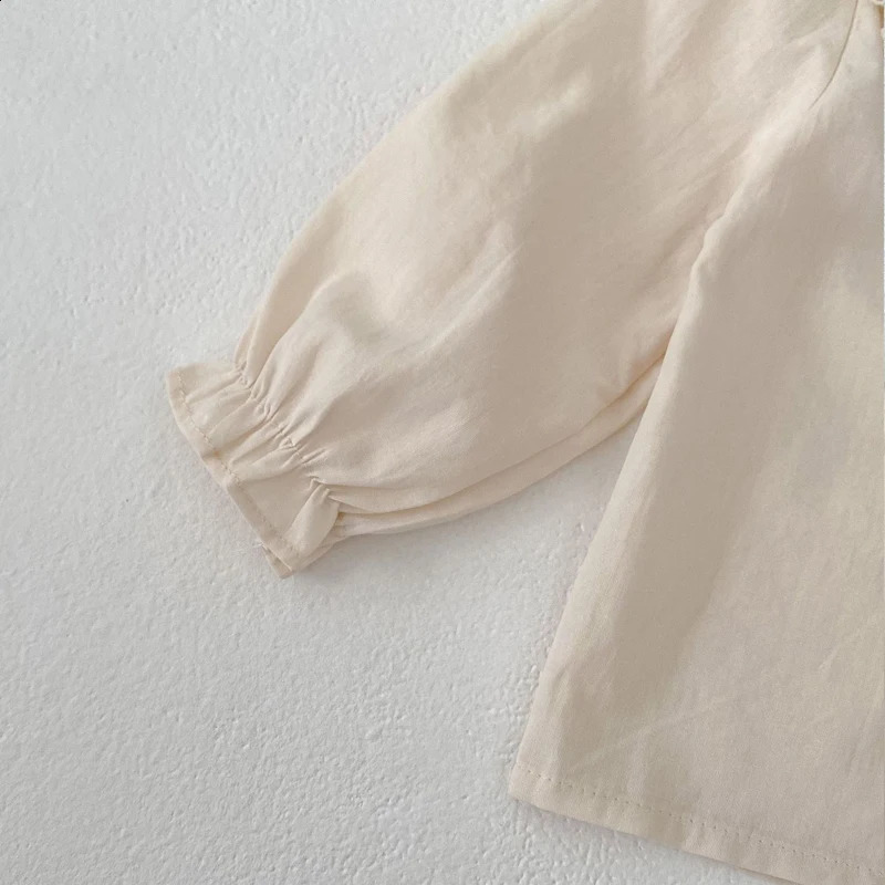 Spring and Autumn Baby Clothing 03 Year Old Female Black Ear Edge Doll Neck Top 250812