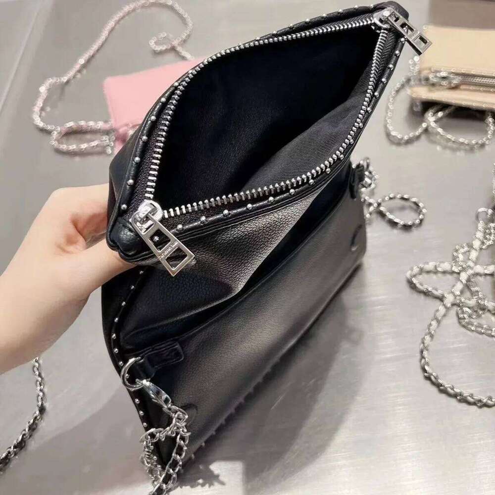 A Designers Bags Pochette Rock Swing Your Wings Bag Womens Tote Handbag Shoulder Genuine Leather Luxury Bag Quality Clutch Flip Chain Cross Body Bags