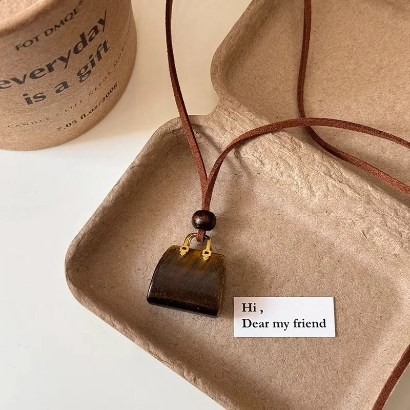Vintage Cute Small Stone Bag Pendant Long Necklace for Women Korean Velvet Sweater Chain Jewelry Versatile Hanging Accessory 250811
