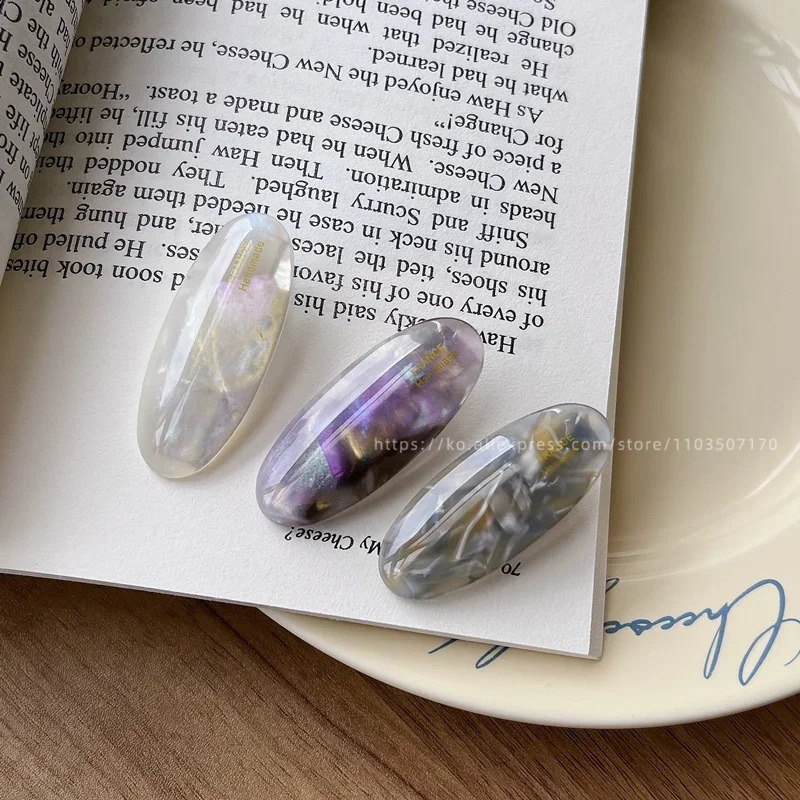 Fever bloggers same elliptical small hair clip Korean French side clip retro bangs clip duckbill clip cute temperament 250812