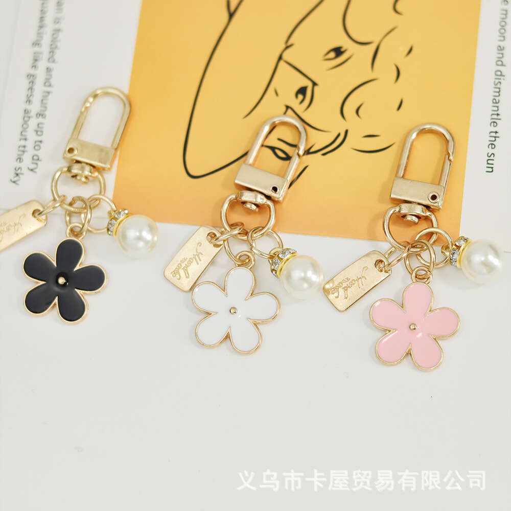 INS Metal Daisy Pearl Keychain Niche Flower Bluetooth Earphone Case Accessories