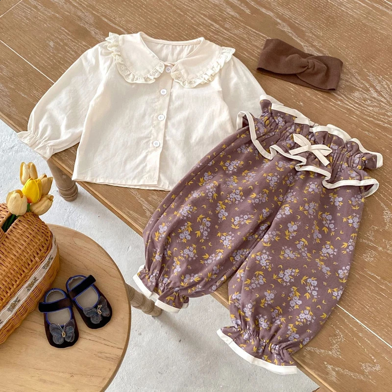 Spring and Autumn Baby Clothing 03 Year Old Female Black Ear Edge Doll Neck Top 250812